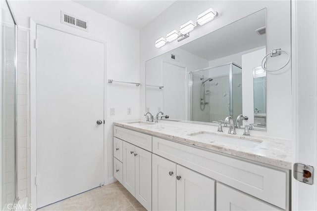 13421 Epping Way, Tustin, CA 92780 - full bath with a shower stall, tile patterned flooring, and double vanity
