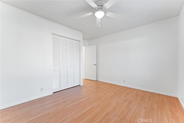 13421 Epping Way, Tustin, CA 92780 - unfurnished bedroom with light wood-style floors, baseboards, a closet, and ceiling fan
