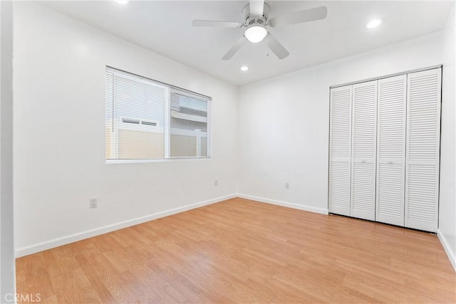 13421 Epping Way, Tustin, CA 92780 - unfurnished bedroom with light wood-style flooring, a closet, recessed lighting, baseboards, and a ceiling fan