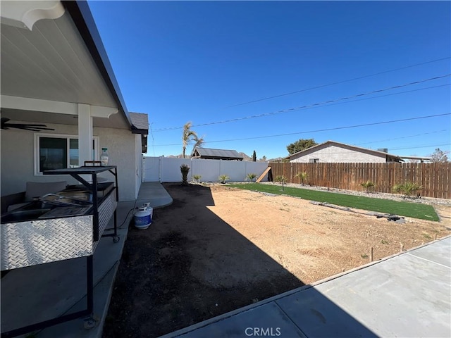 15245 Apache Rd, Apple Valley, CA 92307 - fenced backyard featuring a patio