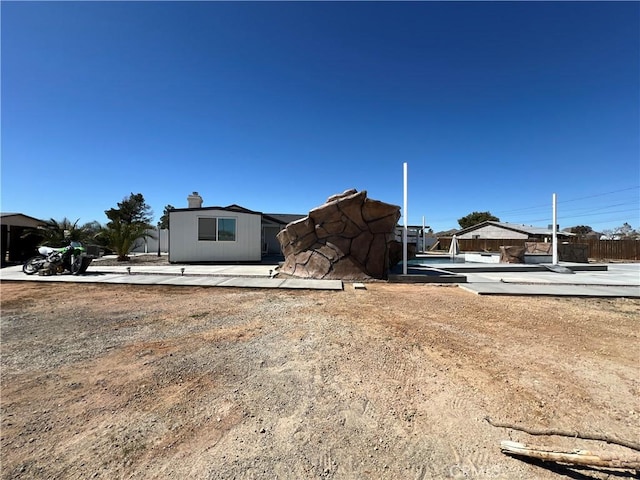 15245 Apache Rd, Apple Valley, CA 92307 - view of front of property with a chimney