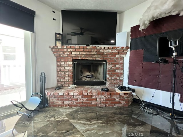 15245 Apache Rd, Apple Valley, CA 92307 - detailed view of a fireplace and a ceiling fan