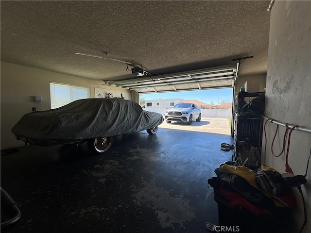 15245 Apache Rd, Apple Valley, CA 92307 - garage featuring a garage door opener