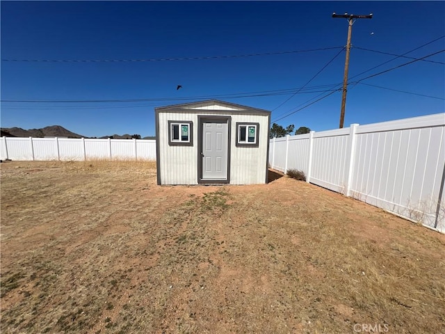 15245 Apache Rd, Apple Valley, CA 92307 - view of shed featuring a fenced backyard