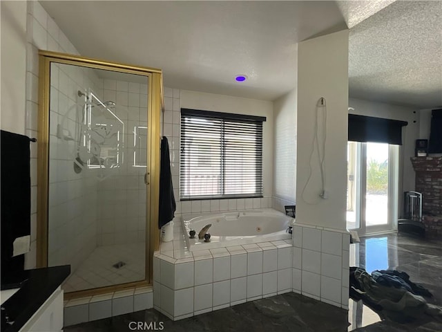 15245 Apache Rd, Apple Valley, CA 92307 - full bathroom with a whirlpool tub, a stall shower, vanity, and a textured ceiling