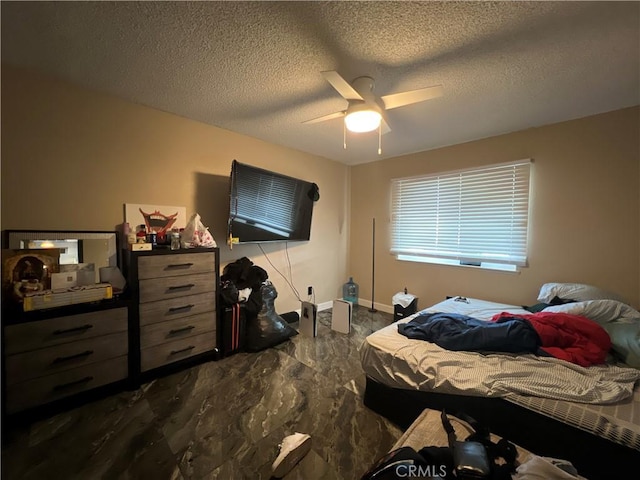15245 Apache Rd, Apple Valley, CA 92307 - bedroom featuring a textured ceiling, a ceiling fan, and baseboards