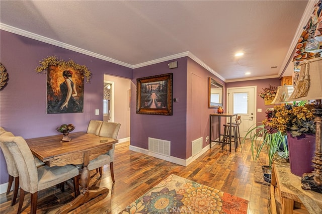 43156 41st St W, Lancaster, CA 93536 - dining area featuring hardwood / wood-style flooring, baseboards, ornamental molding, and recessed lighting