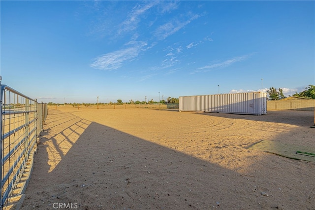 43156 41st St W, Lancaster, CA 93536 - view of yard featuring an outbuilding, an outdoor structure, and a rural view