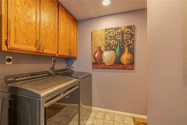 43156 41st St W, Lancaster, CA 93536 - laundry area with cabinet space, washing machine and clothes dryer, baseboards, light tile patterned flooring, and recessed lighting