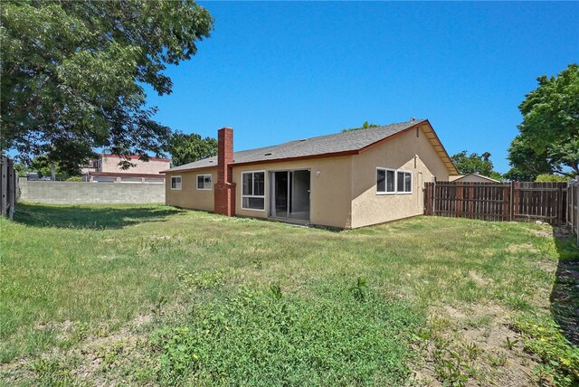 1018 N Millard Ave, Rialto, CA 92376 - rear view of house with stucco siding