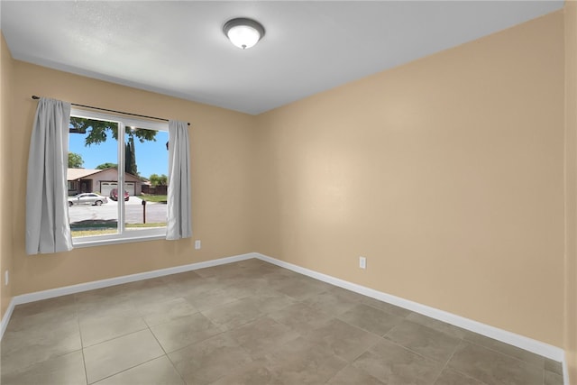 1018 N Millard Ave, Rialto, CA 92376 - spare room featuring baseboards and tile patterned floors