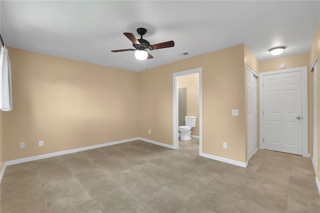1018 N Millard Ave, Rialto, CA 92376 - unfurnished bedroom featuring baseboards, ensuite bathroom, and a ceiling fan