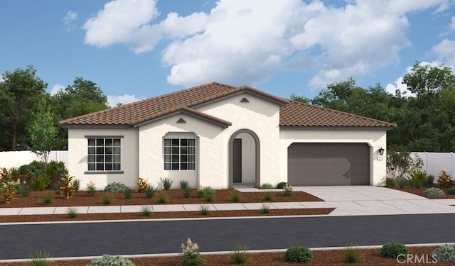 29945 Ruby Way, Cathedral City, CA 92234 - mediterranean / spanish-style house with a tile roof, a garage, driveway, fence, and stucco siding