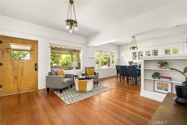 528 E Palmyra Ave, Orange, CA 92866 - living area with wood finished floors and a chandelier