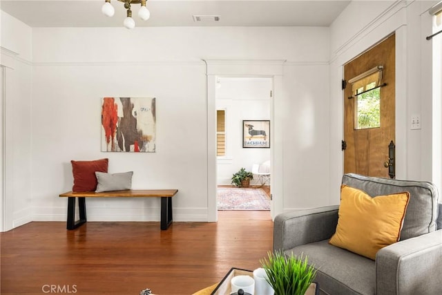 528 E Palmyra Ave, Orange, CA 92866 - sitting room featuring wood finished floors and baseboards