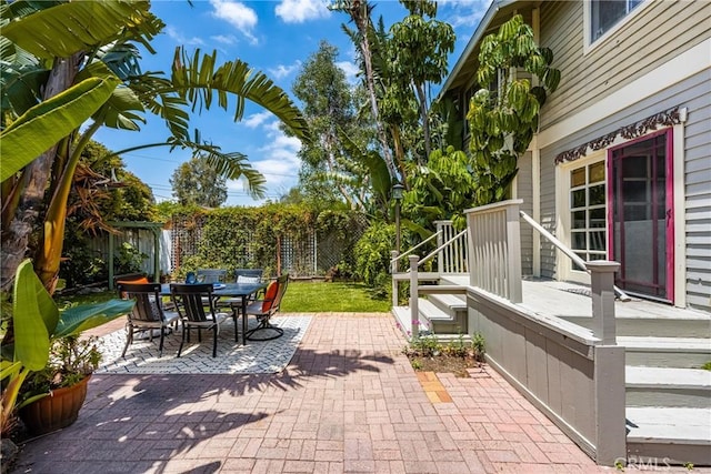 528 E Palmyra Ave, Orange, CA 92866 - view of patio / terrace featuring outdoor dining space and a deck