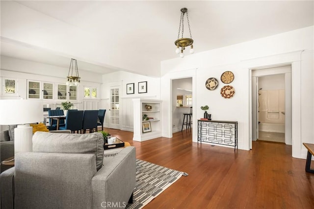 528 E Palmyra Ave, Orange, CA 92866 - living room with a chandelier and wood finished floors