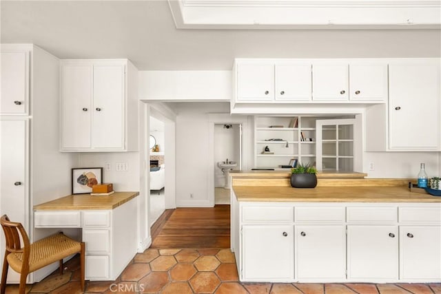 528 E Palmyra Ave, Orange, CA 92866 - kitchen with white cabinetry, light countertops, and light tile patterned flooring