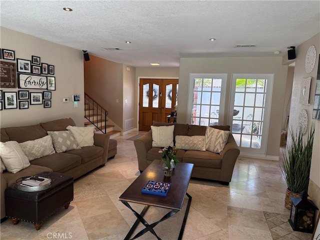 28726 Macklin Ave, Canyon Country, CA 91387 - living room featuring stairway, recessed lighting, a textured ceiling, and baseboards