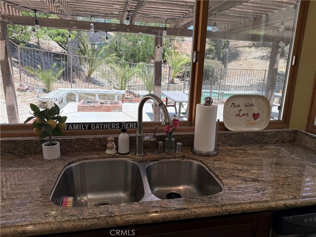 28726 Macklin Ave, Canyon Country, CA 91387 - kitchen view of a sink, dishwasher, and stone countertops