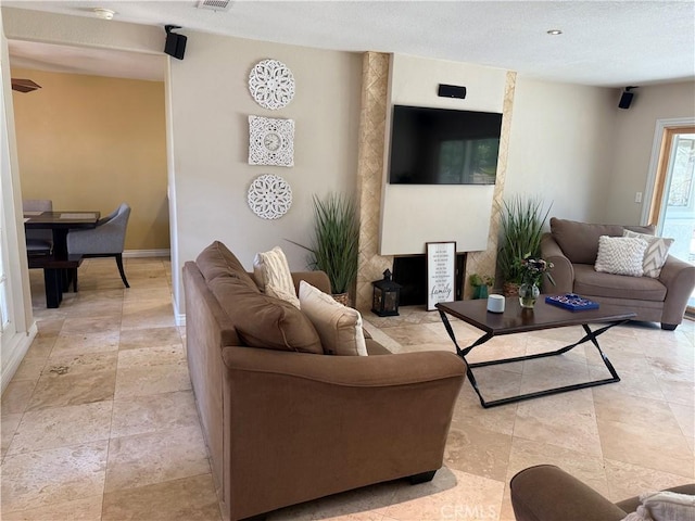 28726 Macklin Ave, Canyon Country, CA 91387 - living room featuring baseboards