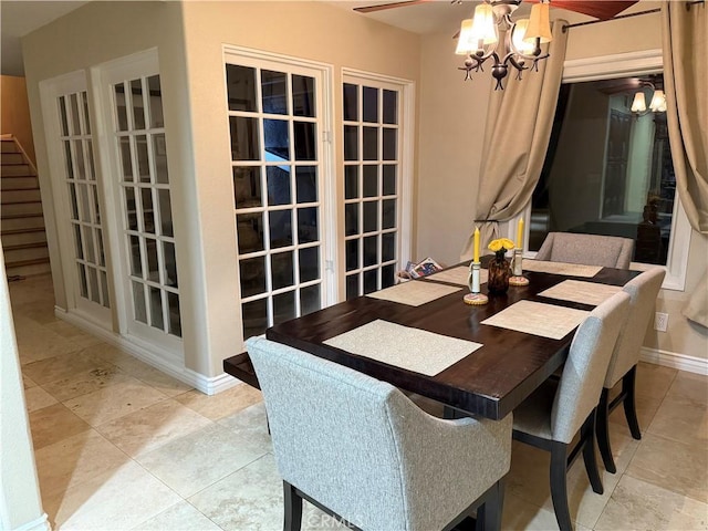 28726 Macklin Ave, Canyon Country, CA 91387 - tiled dining area featuring a chandelier and baseboards