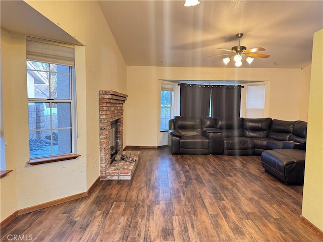 14686 Cool Glen Dr, Helendale, CA 92342 - living area featuring wood finished floors, baseboards, a fireplace, ceiling fan, and lofted ceiling