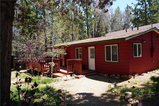 657 Moreno Ln, Sugarloaf, CA 92386 - back of house with a wooden deck