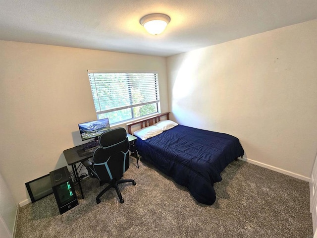 carpeted bedroom with baseboards