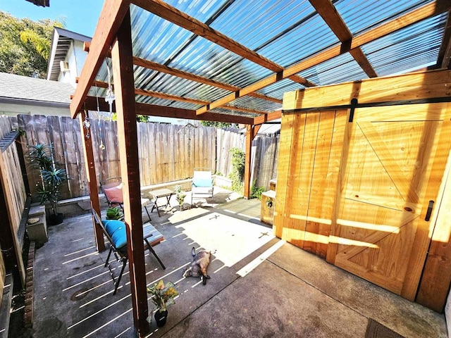 fenced backyard featuring a patio area