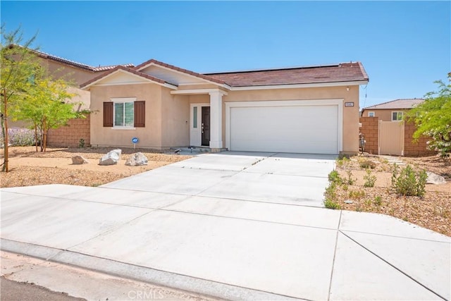 15667 San Diego Ln, Victorville, CA 92394 - ranch-style house featuring a garage, stucco siding, concrete driveway, and a tile roof