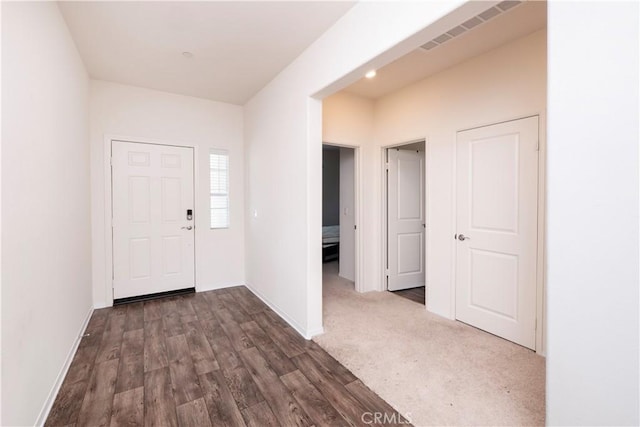 15667 San Diego Ln, Victorville, CA 92394 - foyer featuring baseboards and dark wood finished floors
