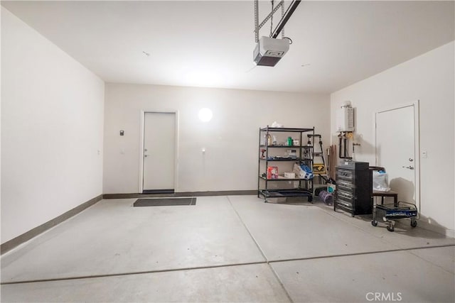 15667 San Diego Ln, Victorville, CA 92394 - garage featuring a garage door opener and baseboards