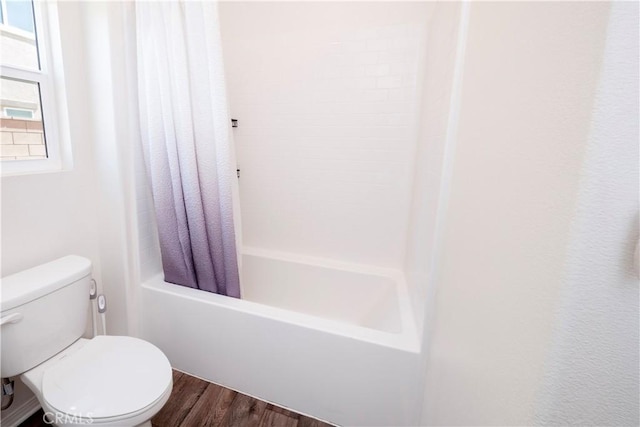 15667 San Diego Ln, Victorville, CA 92394 - full bathroom with wood finished floors, toilet, and shower / tub combo