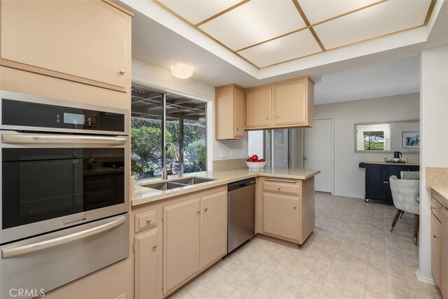 251 Mountain Crest Rd, Duarte, CA 91010 - kitchen featuring appliances with stainless steel finishes, a sink, a warming drawer, light countertops, and light flooring
