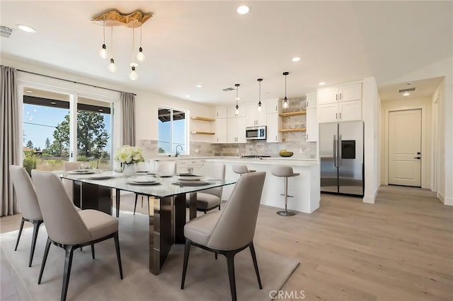 1890 Arrowhead Dr, Paradise, CA 95969 - dining space featuring light wood-style flooring and recessed lighting