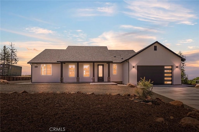 1890 Arrowhead Dr, Paradise, CA 95969 - view of front of property featuring concrete driveway, covered porch, an attached garage, and roof with shingles