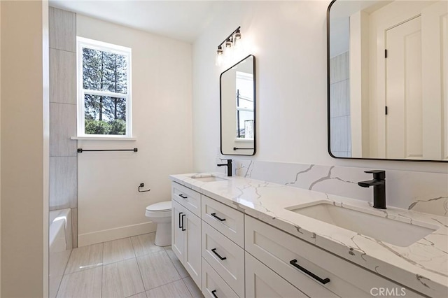 1890 Arrowhead Dr, Paradise, CA 95969 - full bathroom with toilet, baseboards, and double vanity