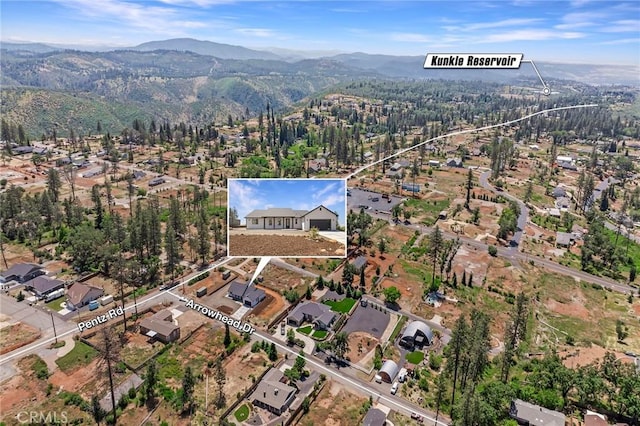 1890 Arrowhead Dr, Paradise, CA 95969 - aerial view of property's location featuring a mountainous background and nearby suburban area