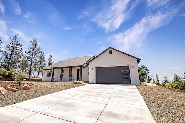1890 Arrowhead Dr, Paradise, CA 95969 - single story home with driveway, an attached garage, and stucco siding