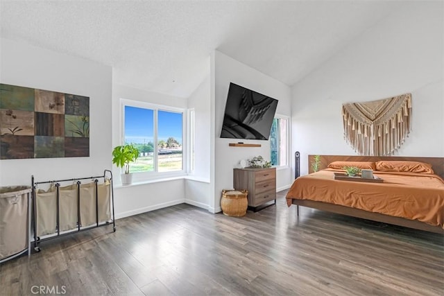 349 S Monte Vista St Unit 20, La Habra, CA 90631 - bedroom with vaulted ceiling, multiple windows, wood finished floors, and baseboards
