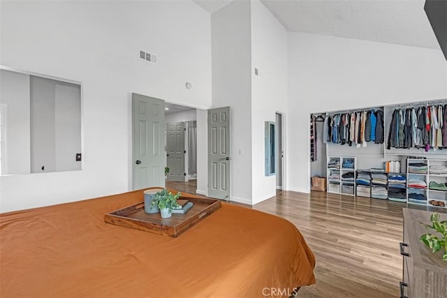 349 S Monte Vista St Unit 20, La Habra, CA 90631 - bedroom featuring high vaulted ceiling, wood finished floors, and baseboards