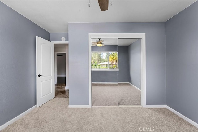 201 Valley View Dr, Oroville, CA 95966 - unfurnished bedroom featuring carpet floors, baseboards, a ceiling fan, and a closet