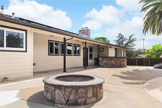 201 Valley View Dr, Oroville, CA 95966 - view of patio featuring a fire pit and fence