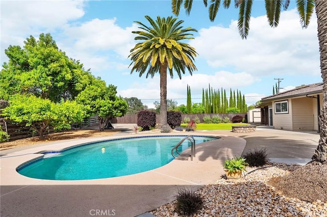 201 Valley View Dr, Oroville, CA 95966 - view of pool with a storage unit, a fenced backyard, a patio, and an outdoor structure