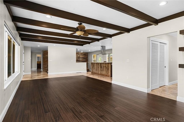 201 Valley View Dr, Oroville, CA 95966 - unfurnished living room featuring beamed ceiling, a ceiling fan, wood finished floors, baseboards, and recessed lighting