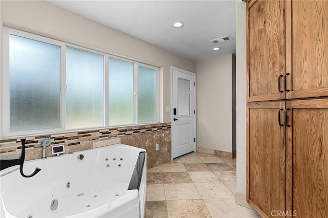 201 Valley View Dr, Oroville, CA 95966 - bathroom featuring a whirlpool tub, baseboards, and recessed lighting