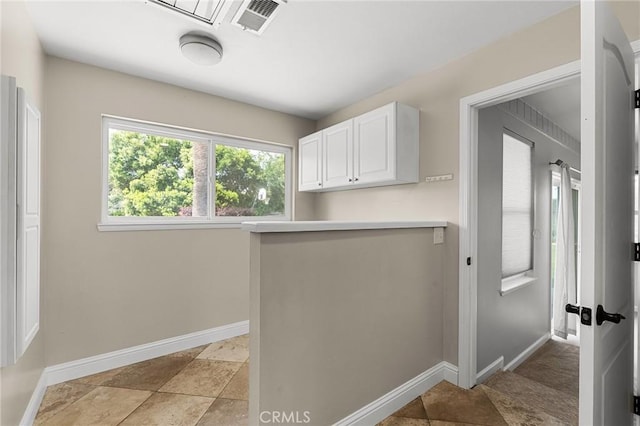 201 Valley View Dr, Oroville, CA 95966 - washroom with baseboards and light stone finish flooring