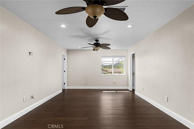 201 Valley View Dr, Oroville, CA 95966 - spare room with a ceiling fan, dark wood finished floors, recessed lighting, a textured ceiling, and baseboards