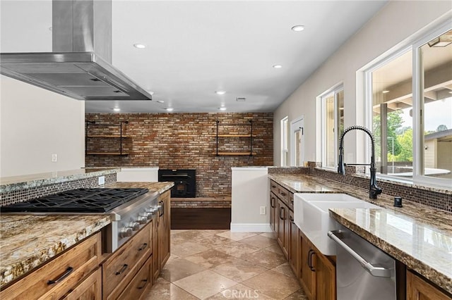 201 Valley View Dr, Oroville, CA 95966 - kitchen with island range hood, stainless steel appliances, recessed lighting, a sink, and brown cabinetry